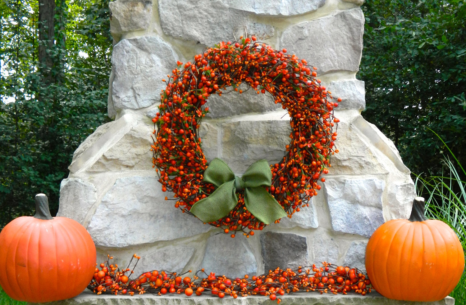 Orange Berry Wreath with Green Leaves and Orange Flowers with Bow