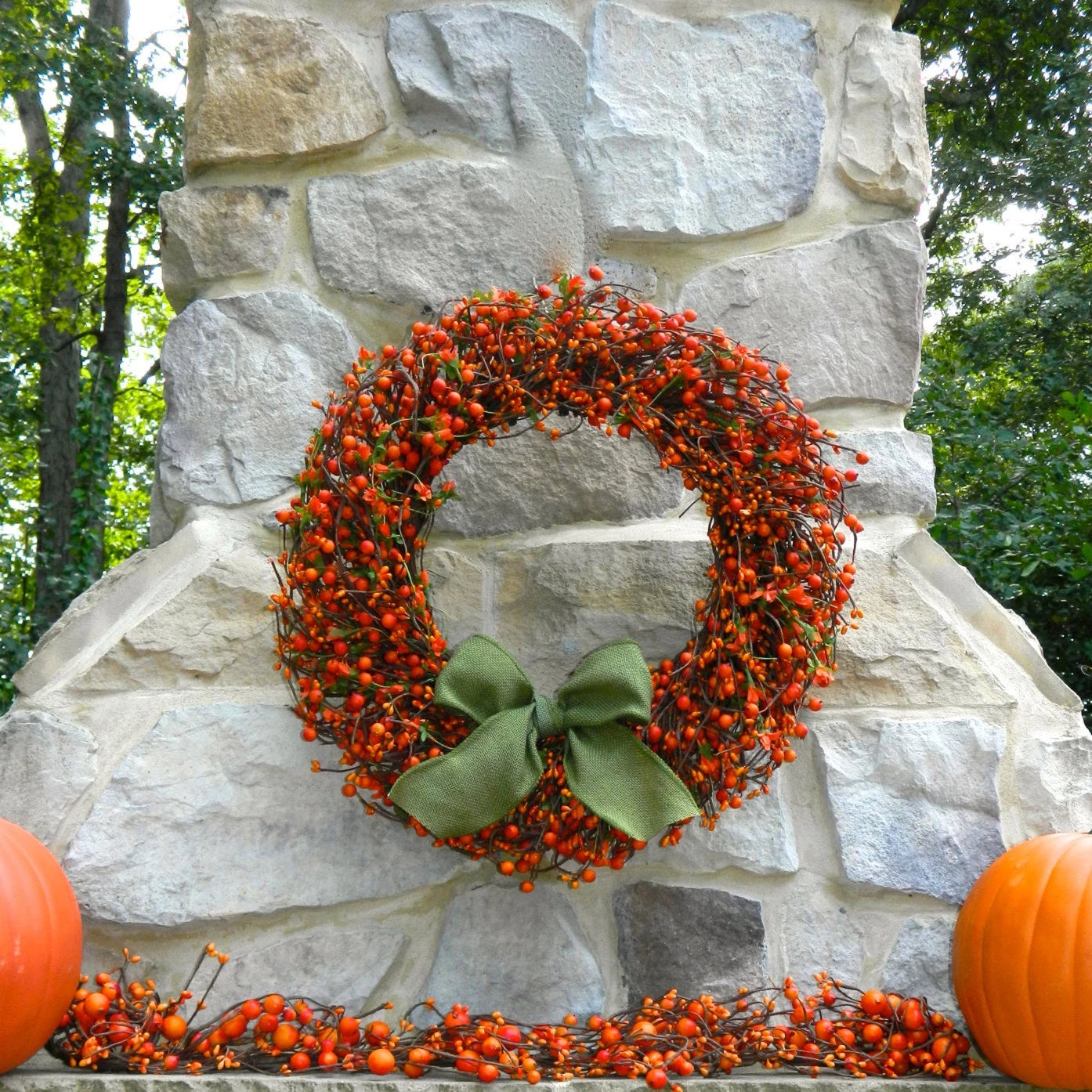Orange Berry Wreath with Green Leaves and Orange Flowers with Bow